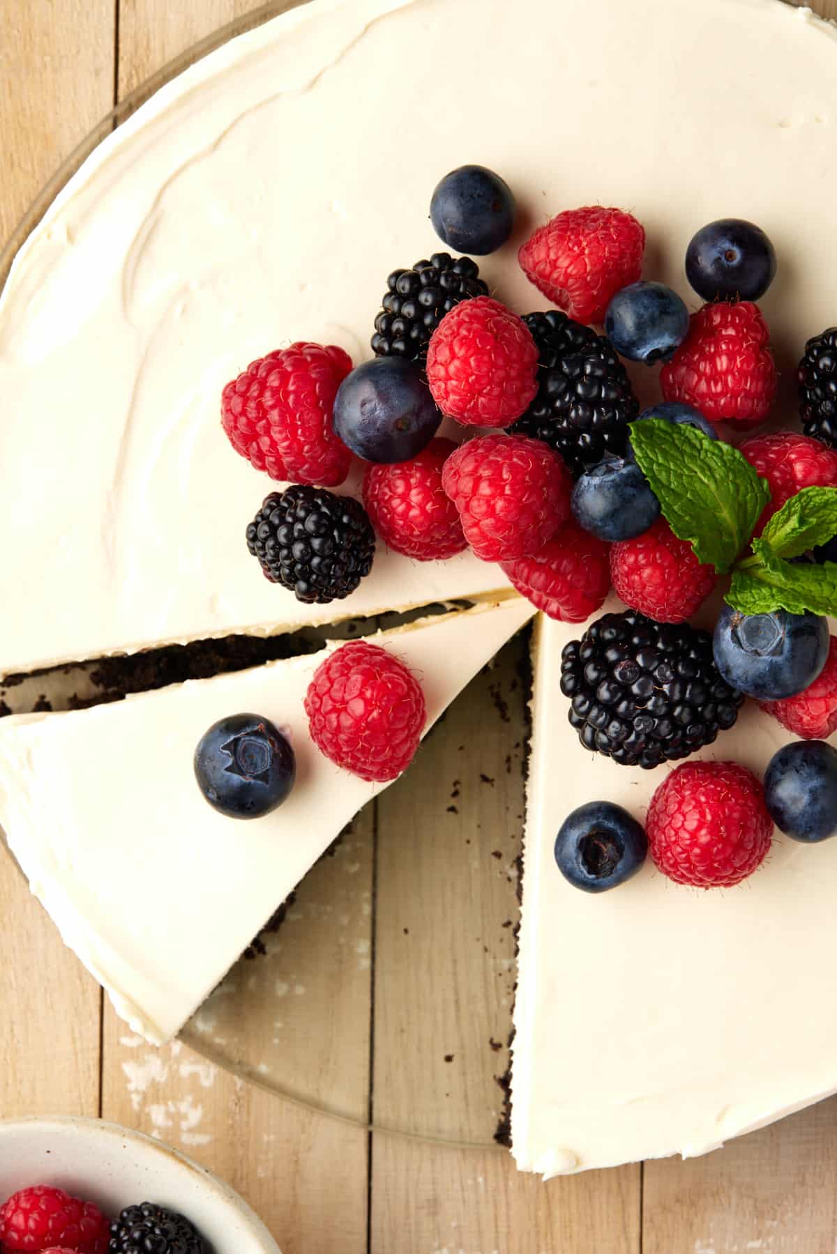 Berries on top of no bake cheesecake. 