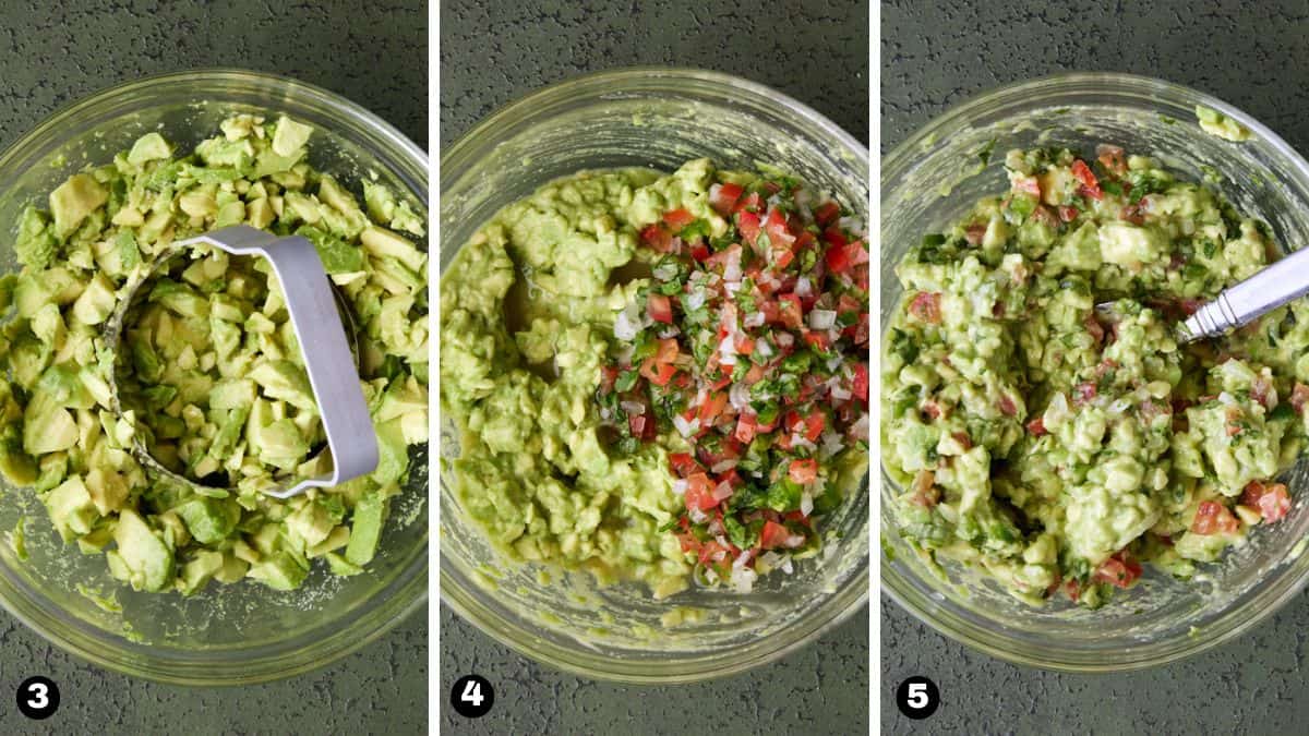 Chopped avocado stirred with pico de gallo in a glass bowl to make chunky guacamole. 