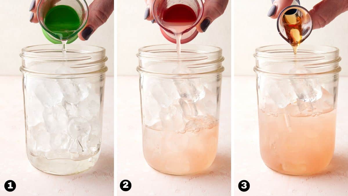 Hand pouring vodka, grapefruit juice and agave into ice-filled mason jar. 