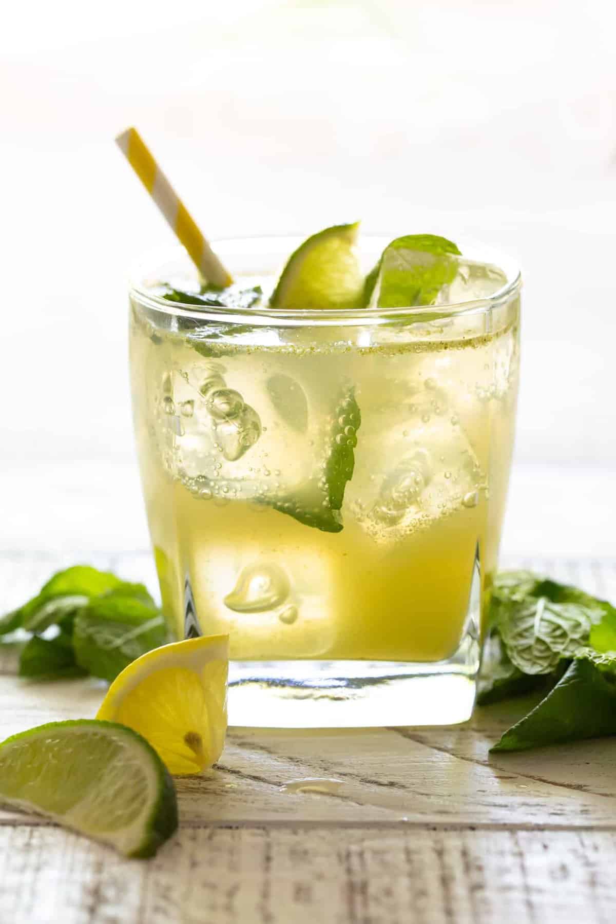 bootlegger drink in a small glass with fresh citrus and mint