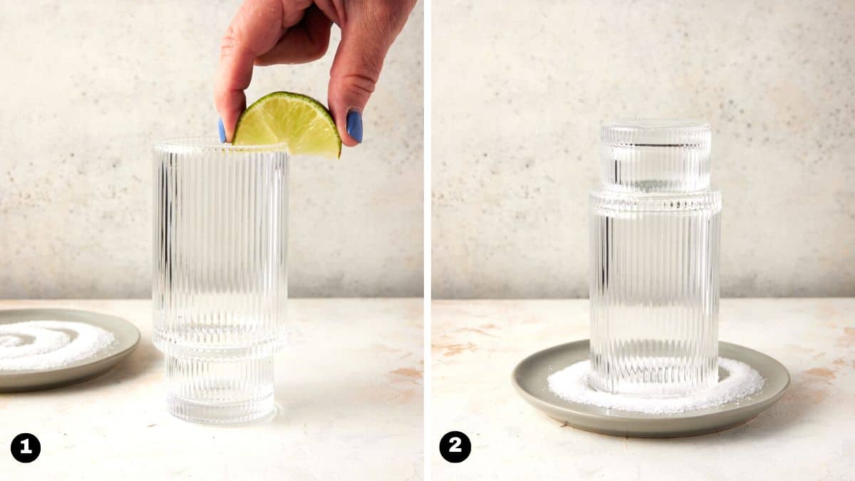 Rimming highball glass with lime wedge and dipping in plate of salt. 