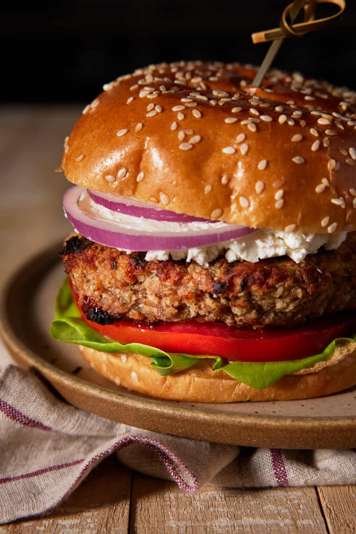 Grilled Turkey Burger on pretzel but with goat cheese.