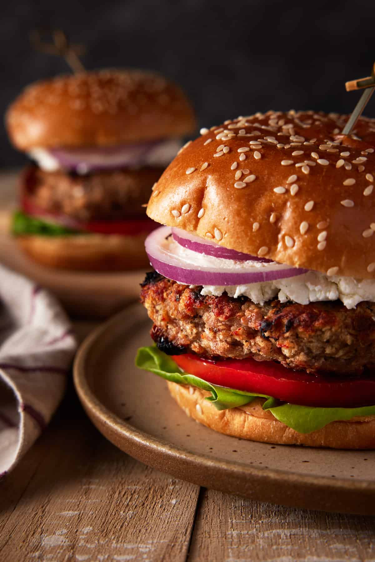 Turkey burger recipe with goat cheese on bun.