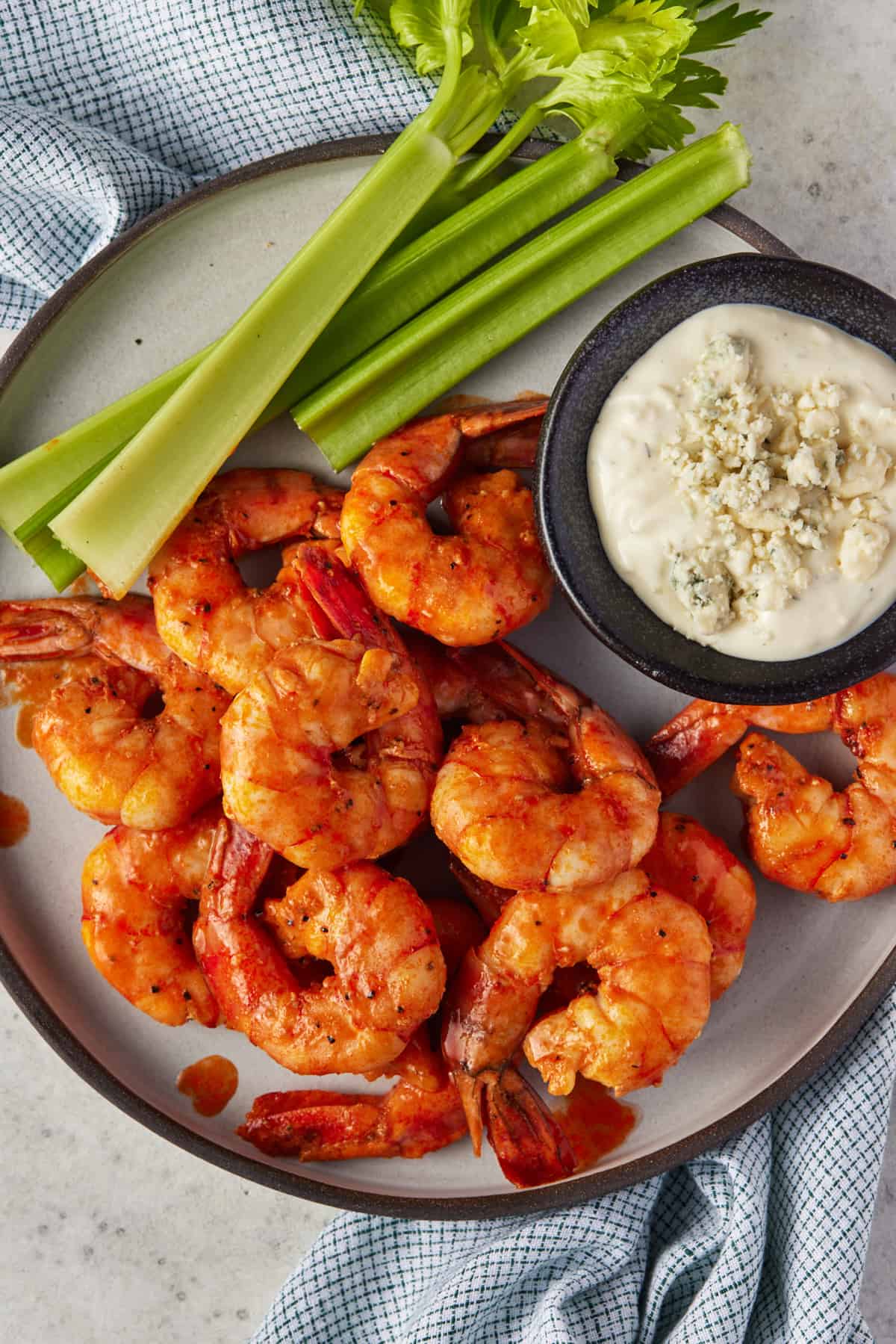 Cooked buffalo shrimp tossed in hot sauce with blue cheese.