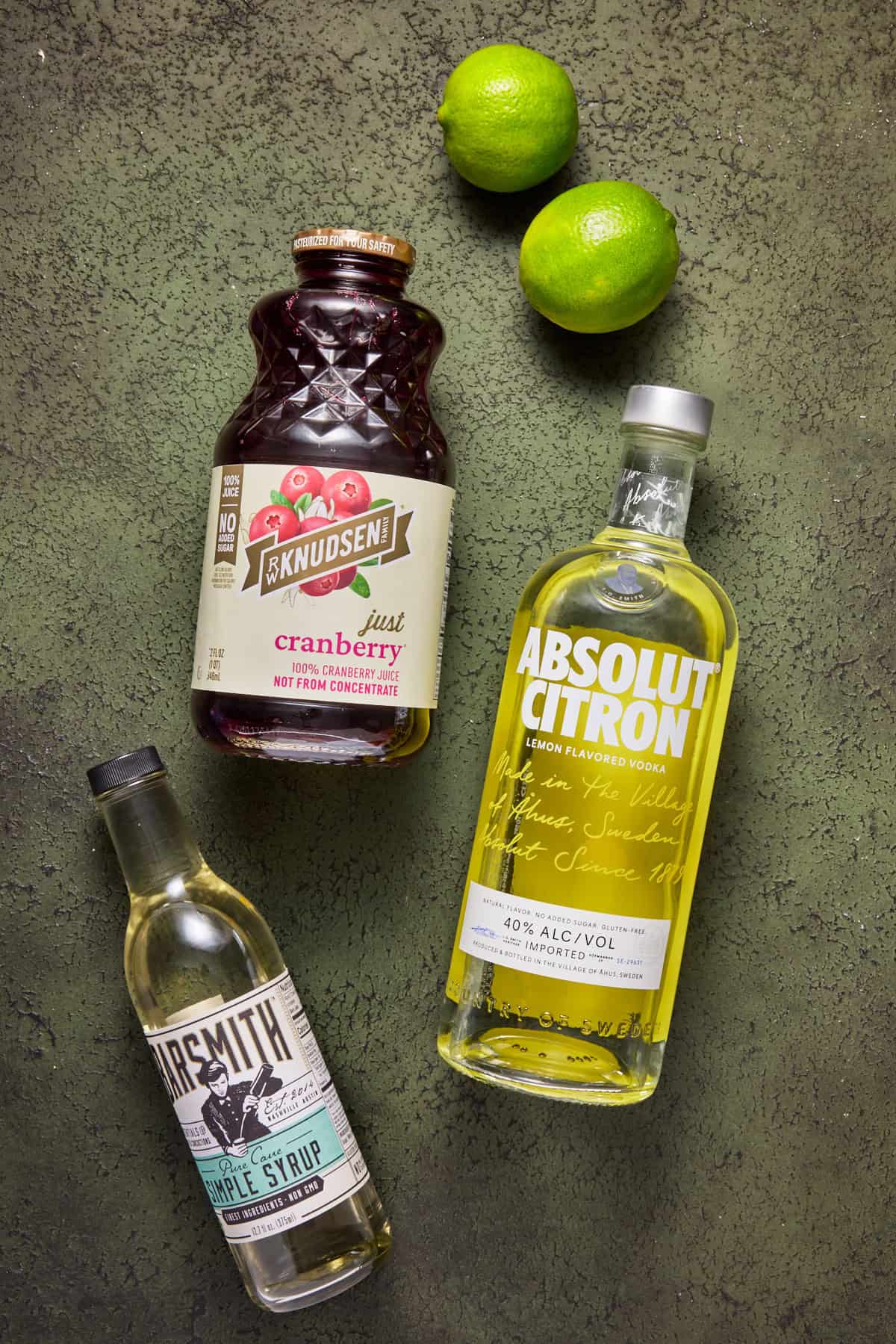 Ingredients need to make a cranberry vodka gimlet.