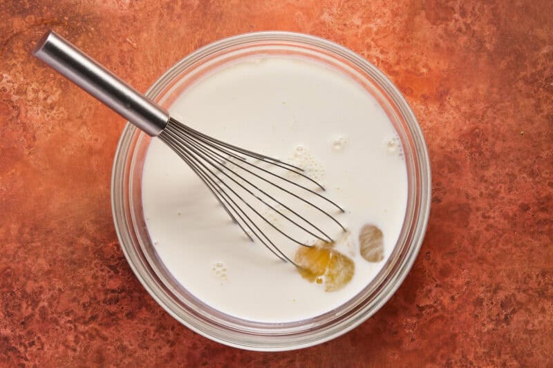Eggs and milk in bowl.