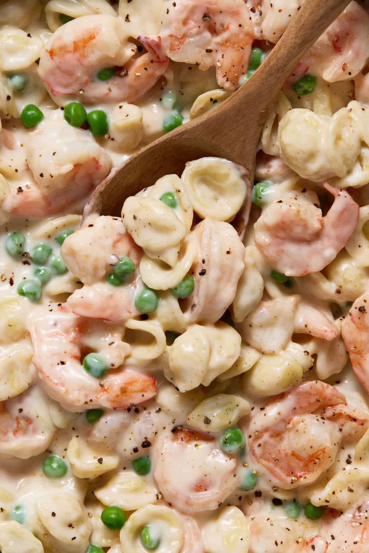 Creamy Shrimp and Pea Pasta in a pan.