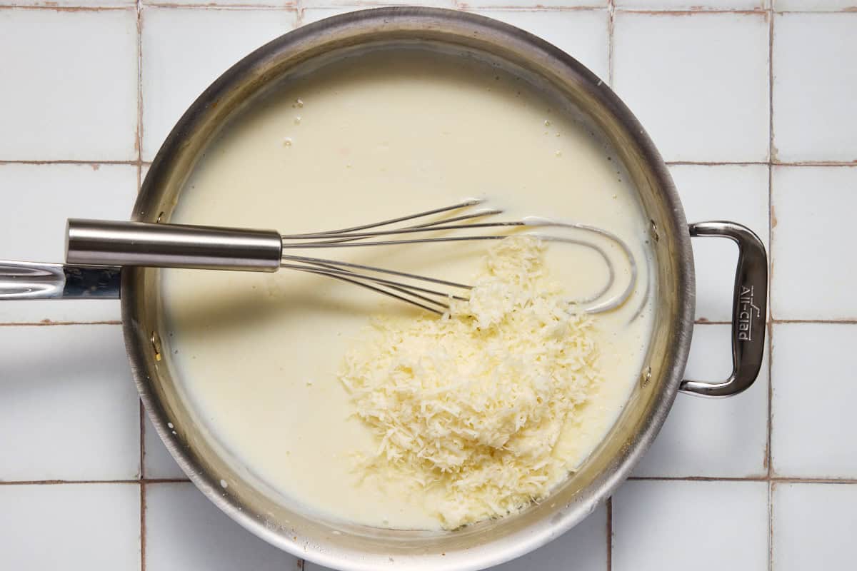 White cream sauce with cheese to be stirred in.