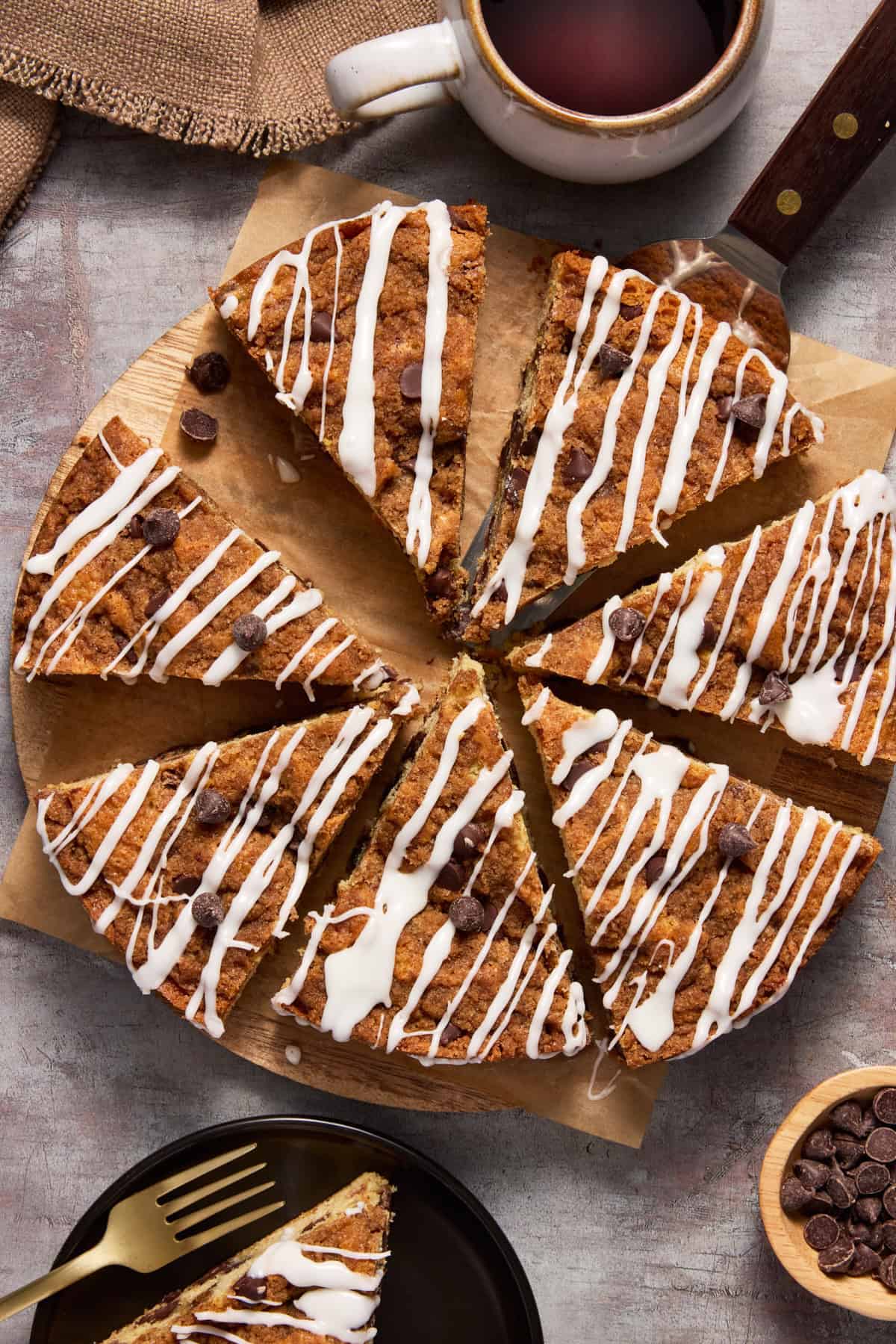 Coffee Cake with frosting and lifter.