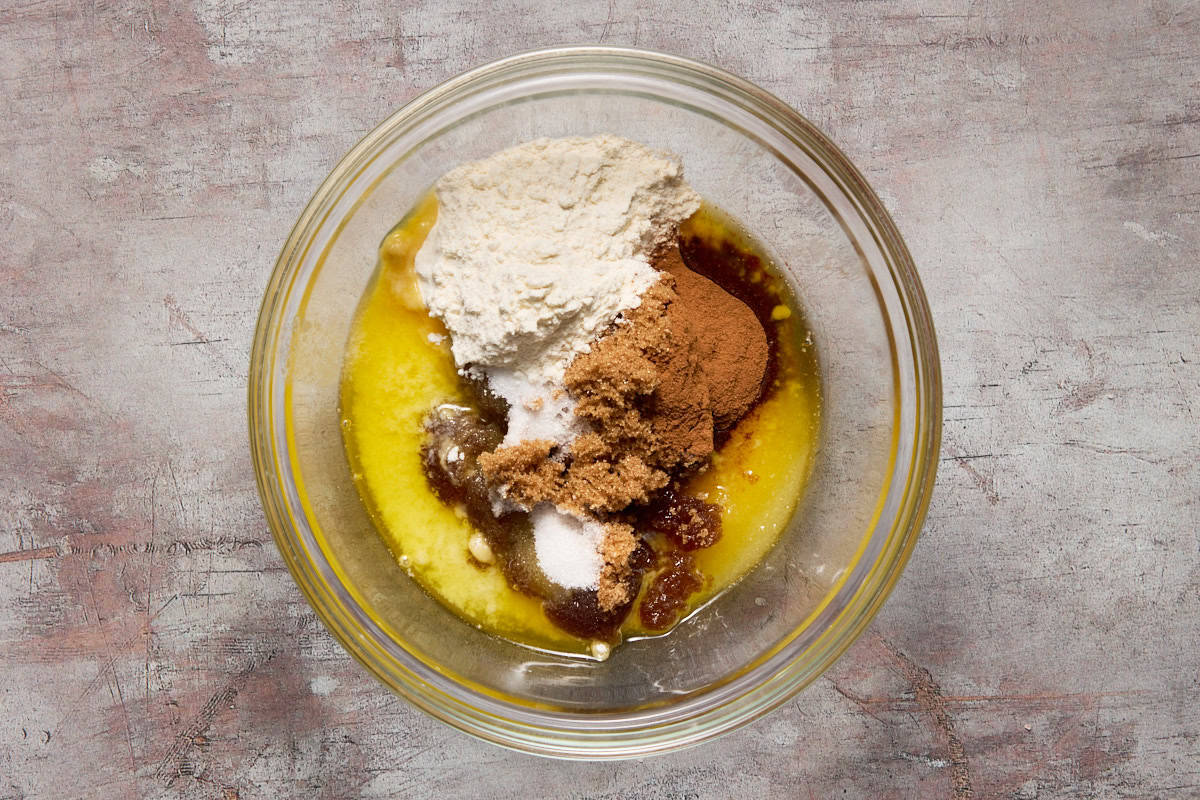 melted butter with sugars and cinnamon in bowl.