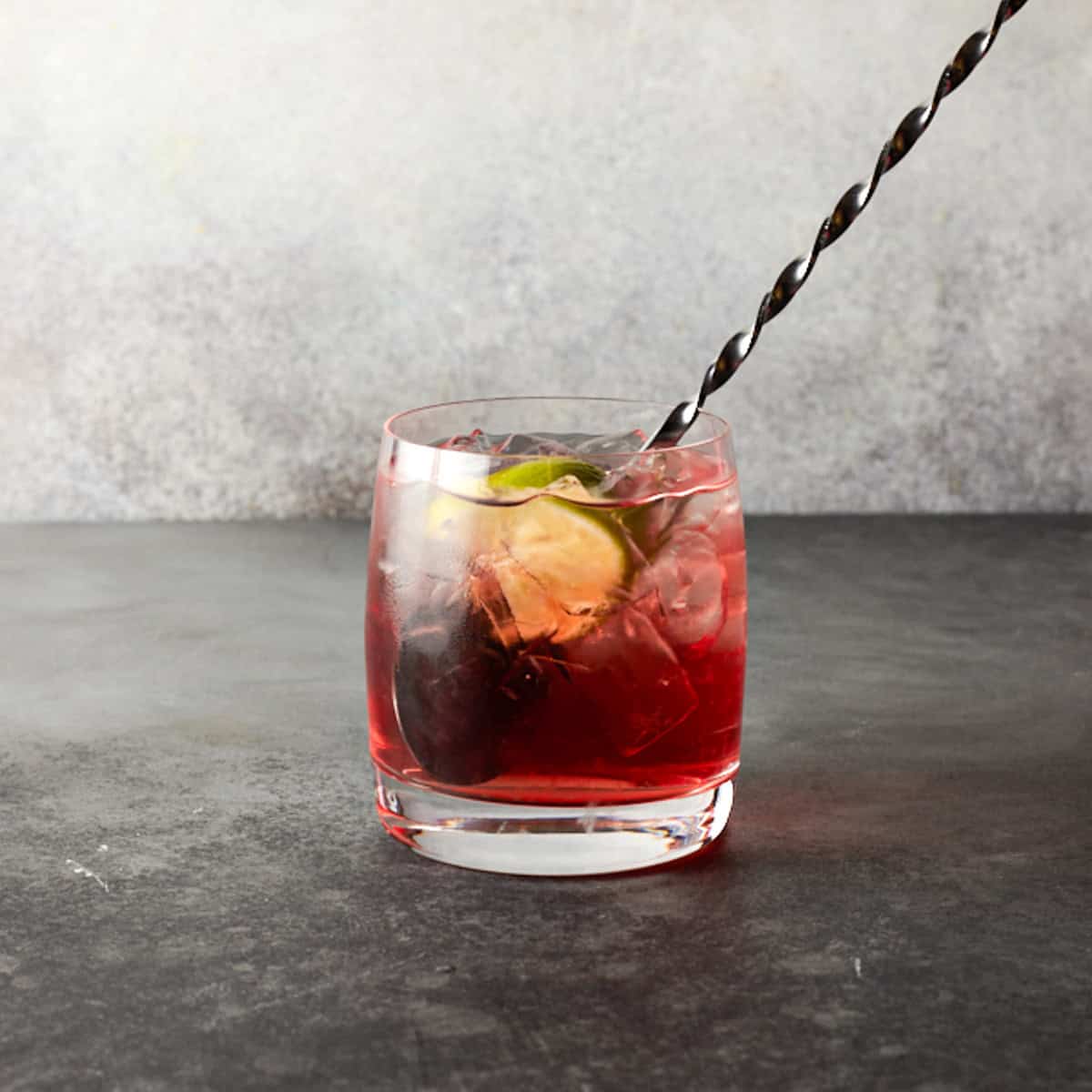 Bar spoon in cape cod drink.