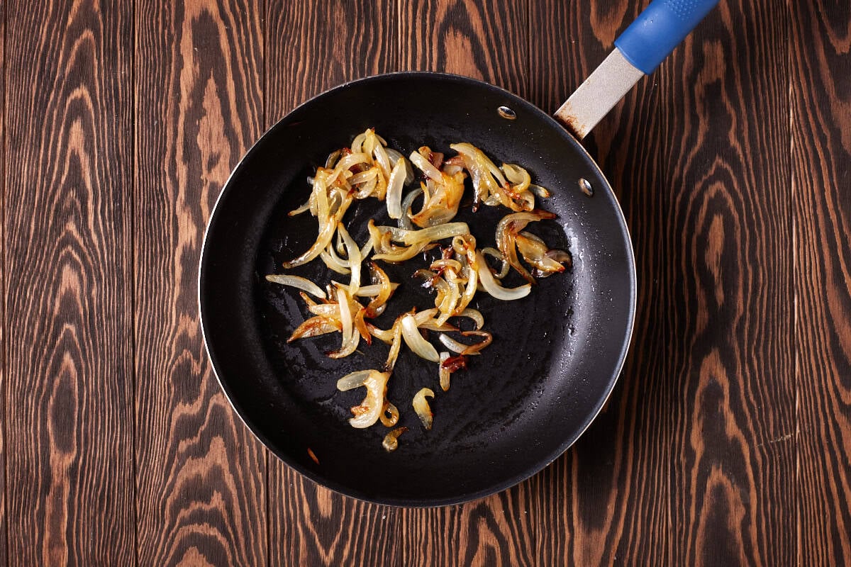 fried onions in pan.