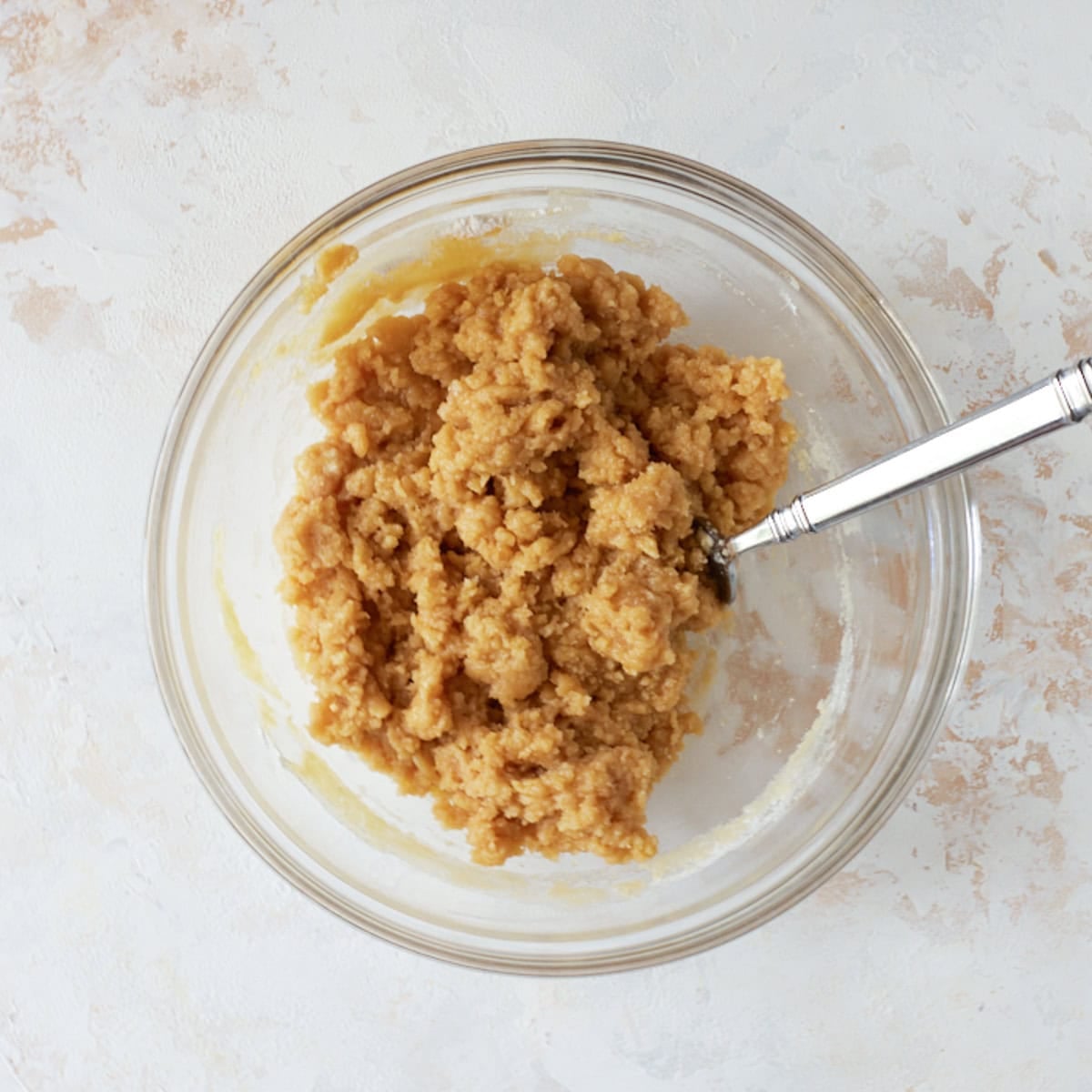 Crumble topping mixed in bowl.