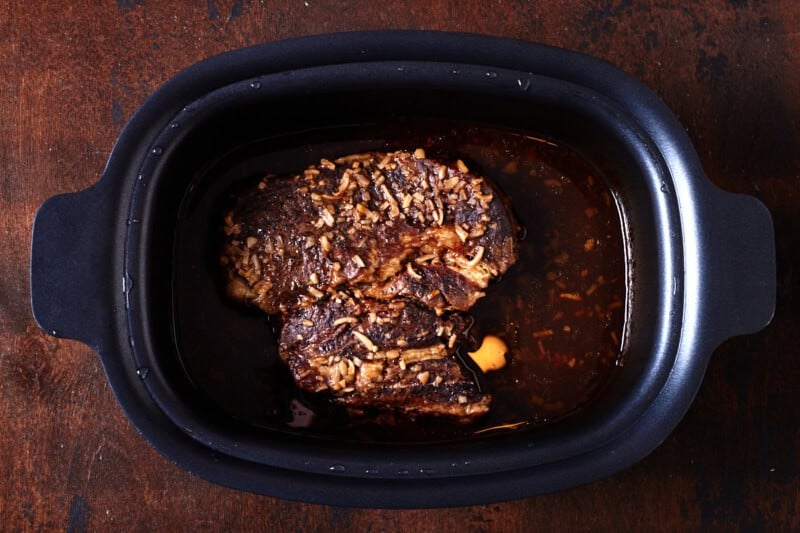 Cooked chuck roast in slow cooker.