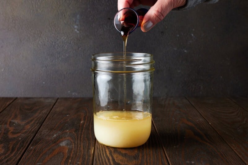 Agave being poured into shaker.