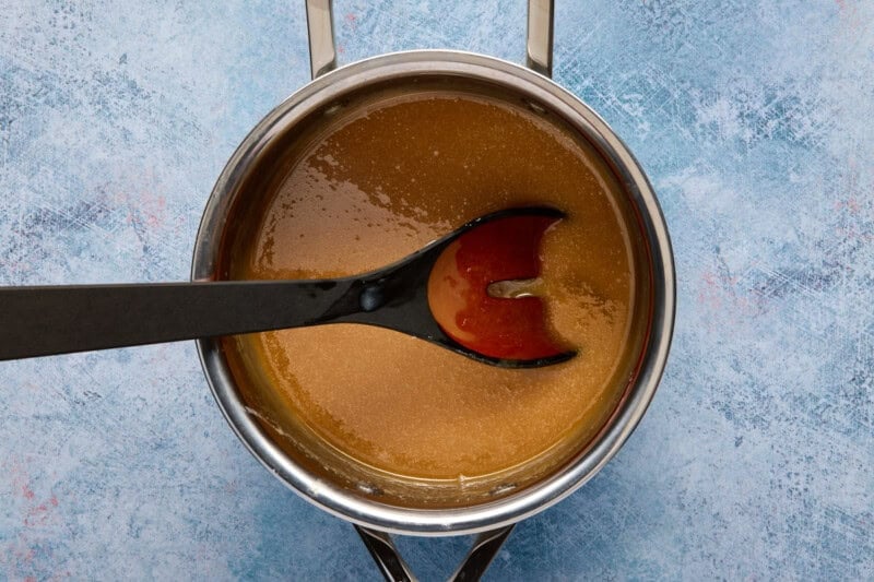 Caramel sauce for caramel rolls in a saucepan.