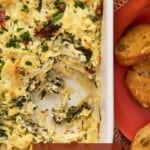 Cooked Crab artichoke dip with crostini.