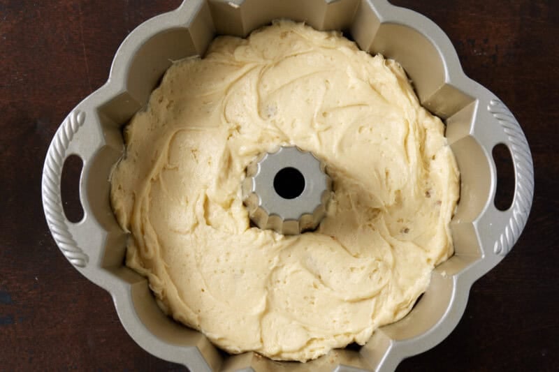 Sour cream coffee cake batter in a bundt pan.