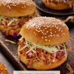 3 brioche buns piled with pulled pork and slaw.