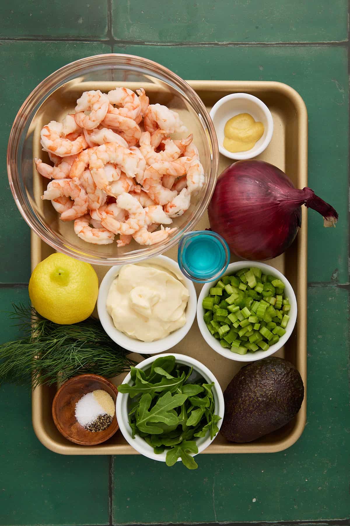 Ingredients needed to make shrimp salad.