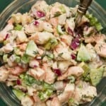A large bowl of Shrimp Salad with fresh dill on top.