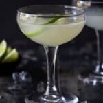 Coupe glass filled with classic daiquiri cocktail.