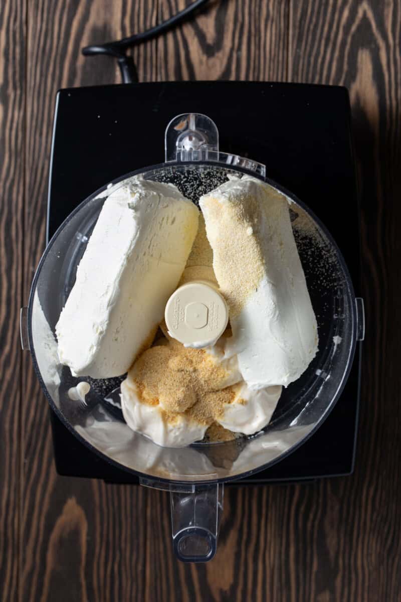 cream cheese, mayo and seasonings in bowl of food processor.