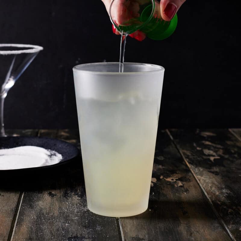 Ingredients being added to shaker.