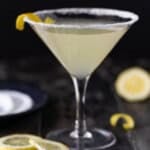 Lemon Drop martini in sugar rimmed glass with lemon slices.