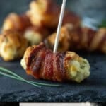 close up of Bacon Cream Cheese Bites on slate plate.