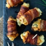 Bacon Cream Cheese Bites on a plate with toothpicks and chopped chives.