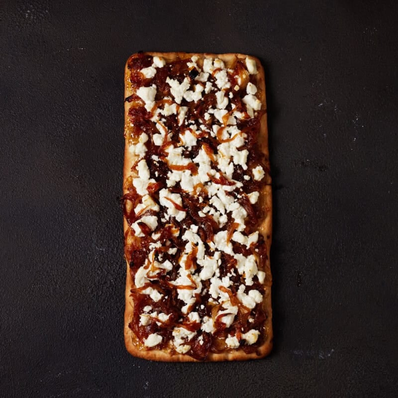Goat cheese flatbread with caramelized onions, and fig jam.