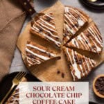 5 slices of Sour Cream Chocolate Chip Coffee Cake on a wooden board with chocolate chips.