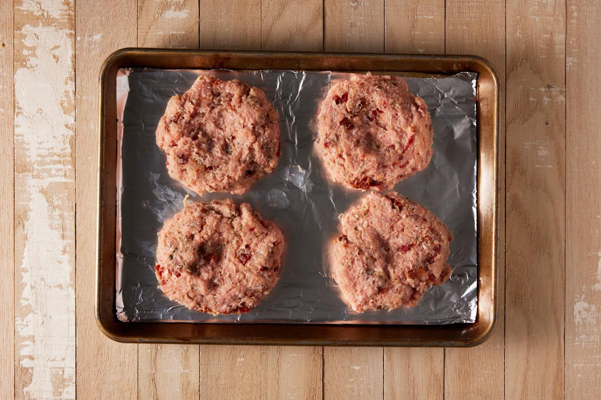 Raw turkey burger patties