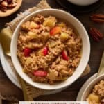 Baked steel cut oatmeal in bowls with gold spoons and a cup of coffee.