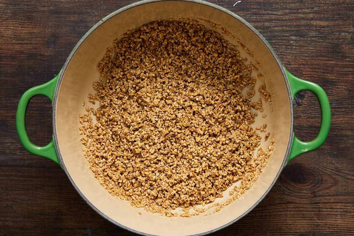 Toasted steel cut oats in a dutch oven.