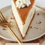 A slice of Biscoff Cheesecake with cookie butter topping on a cream dessert plate with a gold fork.